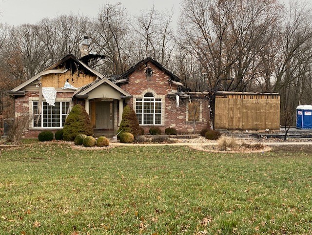 Front of Burnt House without Komodo Spray System in Saint Peters, MO